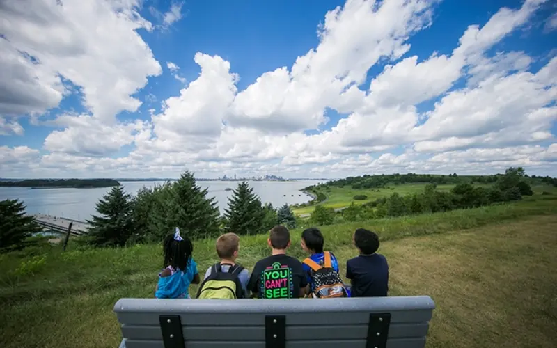 Children looking out at Boston from the Harbor Islands