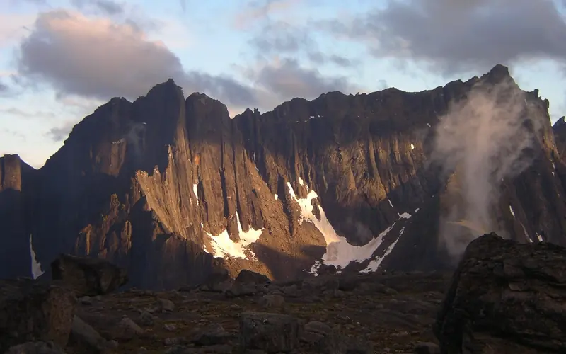 Alpenglow on the granite cliffs of mountains