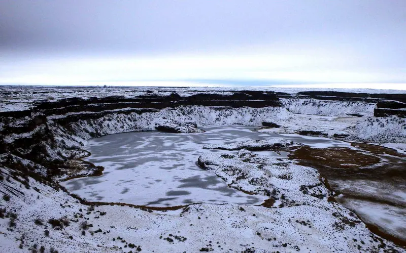 Dry Lake lake bed and falls blanked with snow.