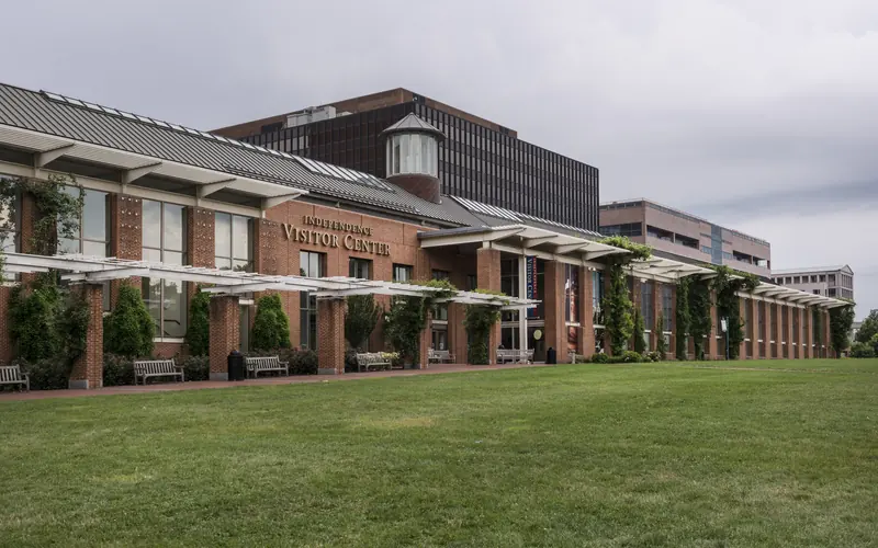 A color photo of the Independence Visitor Center showing a brick building with tall windows.