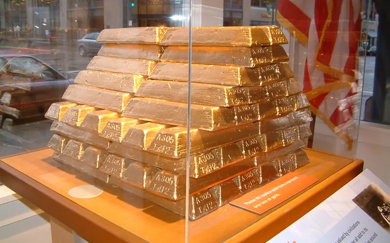 One ton pile of gold bars
