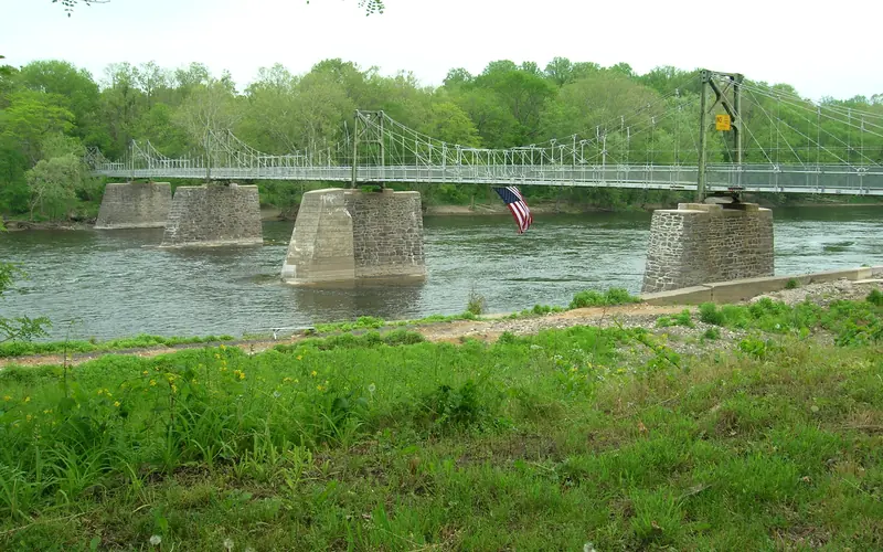 An old stone-pier bridge over a river
