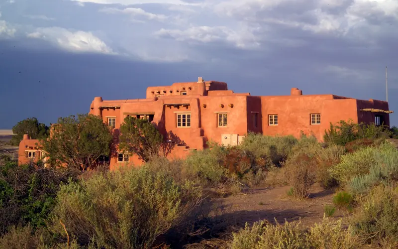 Sunset lights up the Painted Desert Inn National Historic Landmark west side.