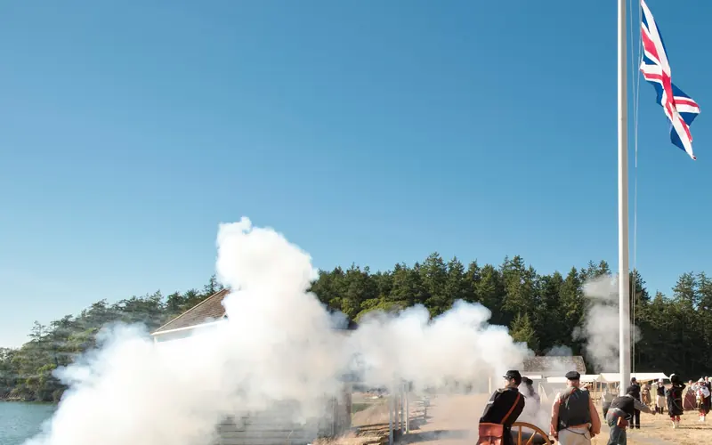 a historic cannon being fired