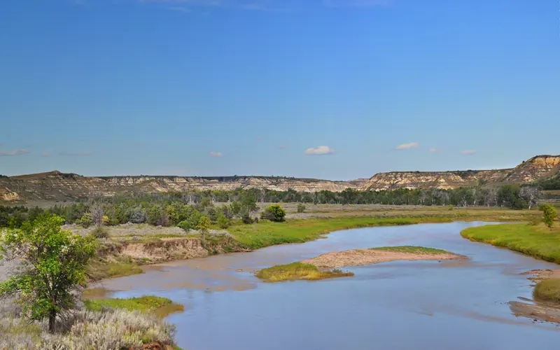 the Little Missouri River under blue skies